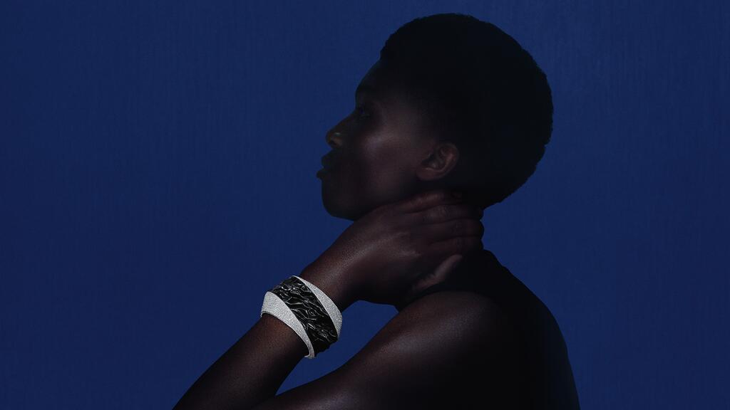 The “Eau D’ Encre” cuff bracelet with obsidian and diamonds in titanium and 18-carat white gold Eau D’ Encre Bracelet